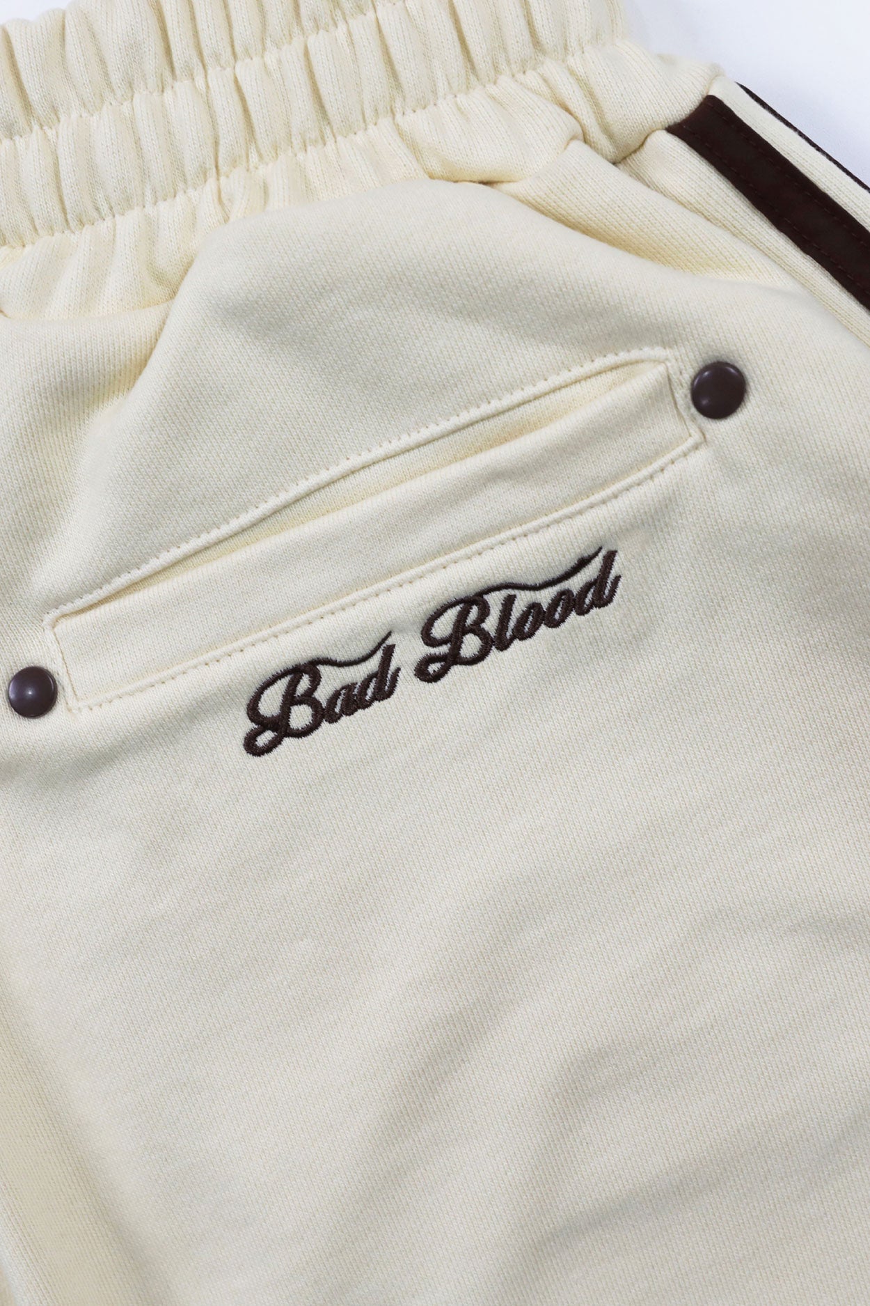 Badblood Billy 2 Way Curved Jogger Trousers Banana Milk