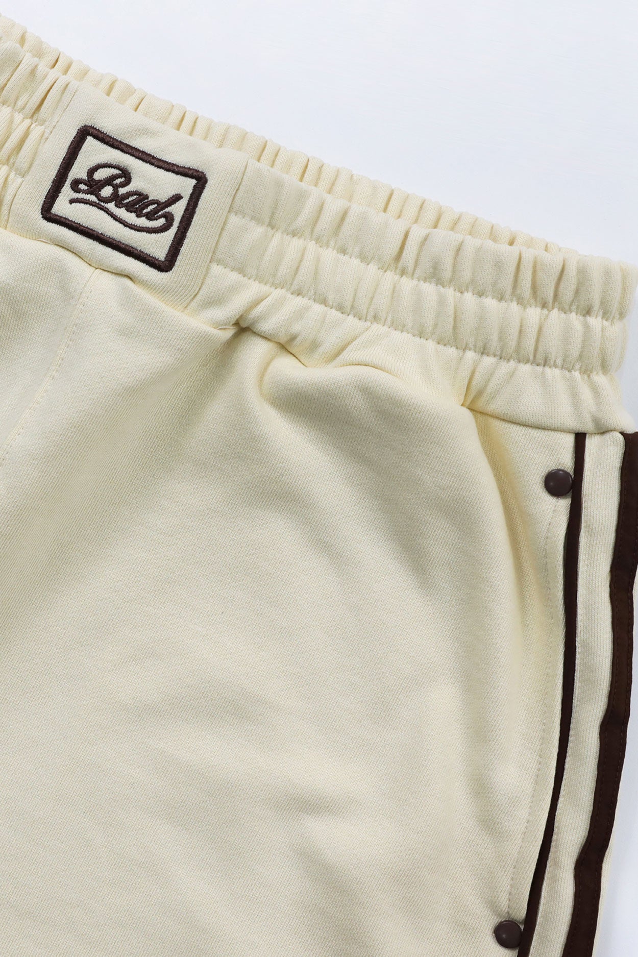 Badblood Billy 2 Way Curved Jogger Trousers Banana Milk