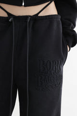 Badblood Embossed logo jogger trousers brushed Black